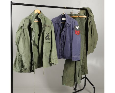 Am M65 Man's Field Coat with hood Medium Regular size by Roland sportswear Inc. Another similar, Large Regular, with US NAVY 