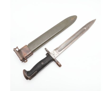 With a 25cm pointed single edged blade with broad fuller, marked to the ricasso U.C. U.S., with two part ribbed plastic grip 