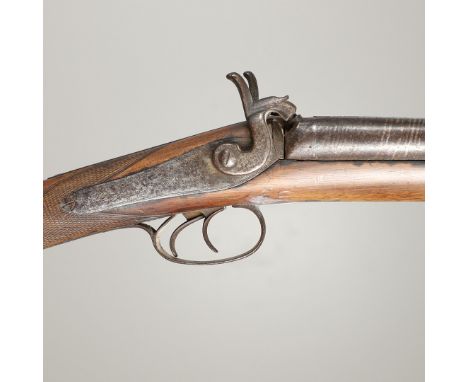 A double barreled shotgun with 75 cm Damascus barrels, 17.55 mm at the muzzle, with twin percussion firing action, engraved l