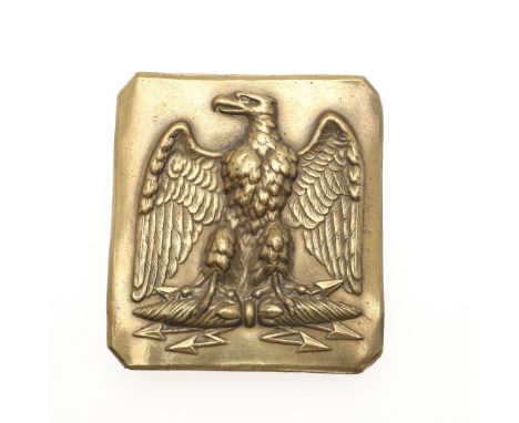 A large rectangular brass belt buckle with canted corners embossed with a Napoleonic eagle standing on lightning bolts, 7 x 6