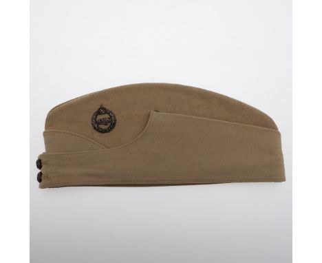A Second Dragoon Guards (Queeen's Bays) Officer's Khaki Drill pattern Field Service Cap. With a small size Bays cap badge and