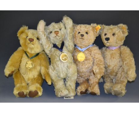 Steiff - a group of four Annual Year Bears, 2001;  2002;  2003; 2004, each golden mohair, with yellow tags and ear buttons, a