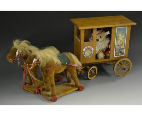 A Steiff Santa's Express, white tag No 037986, LE 2002, blonde mohair Teddy Santa, within a wooden carriage, drawn by pair of