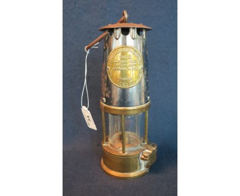 'Protector Lamp &amp; Lighting Company Ltd' brass miner's safety lamp. (B.P. 24% incl. VAT)