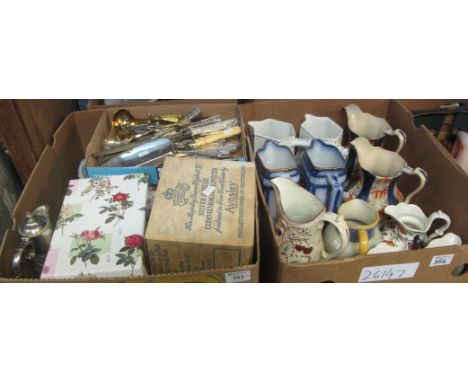 Two boxes of miscellaneous items to include; Gaudy Welsh and other dresser jugs, various cutlery, stainless steel and silver 