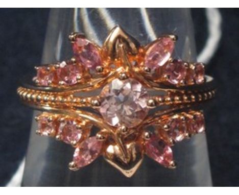 Clogau 18ct rose gold ring set with pink stones. Approximate weight is 4.7g.(B.P. 24% incl. VAT) CONDITION REPORT: Size M 1/2