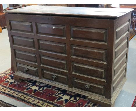 Late 18th Century Welsh oak mule chest having moulded top with bar hinges above front with multiple raised and fielded panels