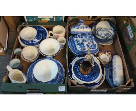 Two boxes of assorted china to include; blue and white willow and other pattern plates, cheese dishes, trinket boxes, gravy b