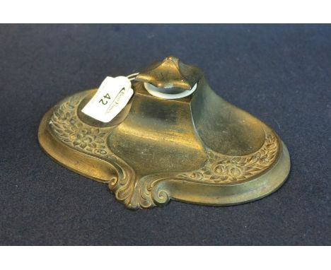 Gilded white metal Art Nouveau style inkwell with relief foliate and scroll decoration and ceramic removable inkwell. (B.P. 2