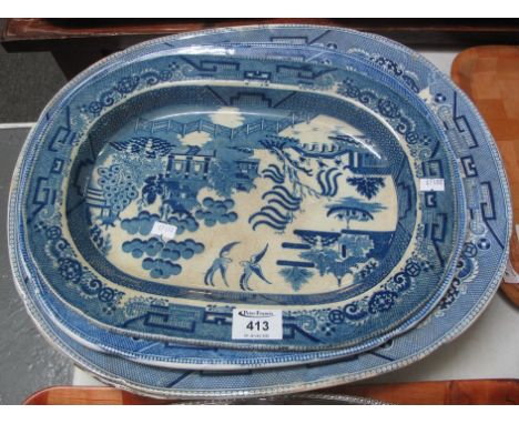 Five blue and white ceramic meat plates of various sizes, four willow pattern, one oriental pattern. (5)(B.P. 24% incl. VAT)