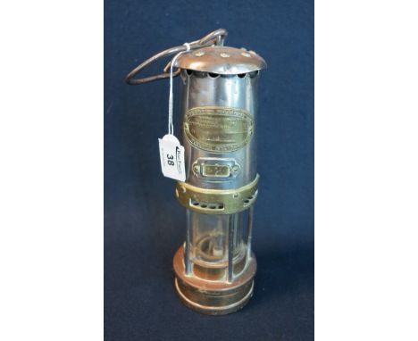 E. Thomas &amp; Williams Ltd brass miner's safety lamp in used condition. (B.P. 24% incl. VAT)