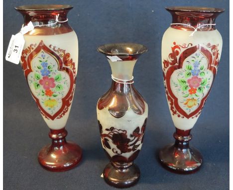 Pair of ruby and frosted glass floral vases of ovoid form, together with another ruby and frosted glass vase overall decorate