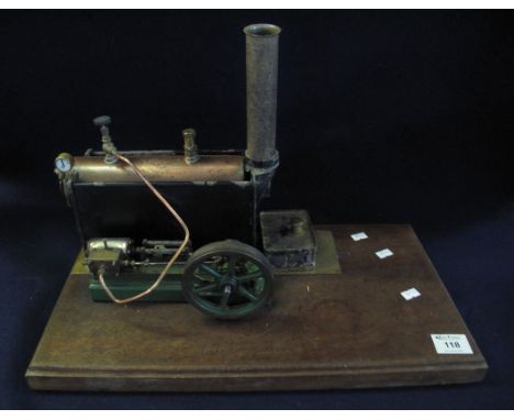 Stuart Turner brass spirit fired stationary engine on mahogany base. (B.P. 24% incl. VAT) CONDITION REPORT: No knowledge if t