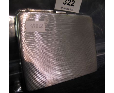 Engine turned silver cigarette case of rectangular form with Birmingham hallmarks.  4.8 Troy ozs approx.(B.P. 24% incl. VAT)