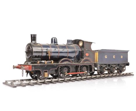 A 2½" Gauge live steam GER 2-4-0 Locomotive and Tender (3), a well-engineered coal-fired model with single inside cylinder, s