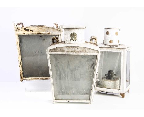 Three Railway Station  Lanterns,  both white painted of rectangular form, one with cylindrical vent (compressed) above three 