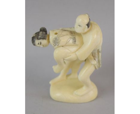 Ivory Netsuke in the shape of Erotica 6.5cm tall signed