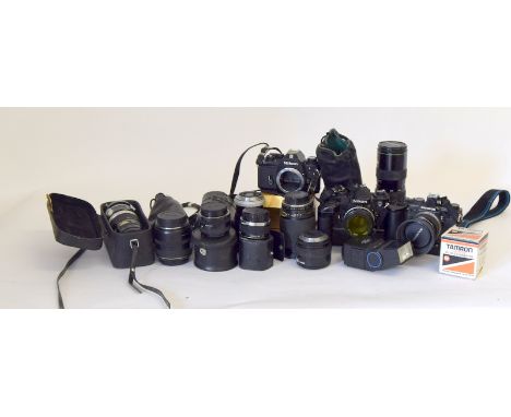 Box of assorted camera lenses to include Nikon & Olympus
