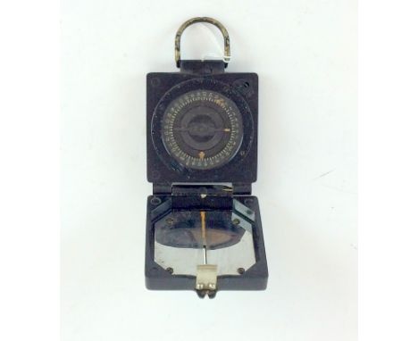 A military marked Mark 1 Magnetic Marching Compass made by T.G.Co.Ltd. Serial number B279153