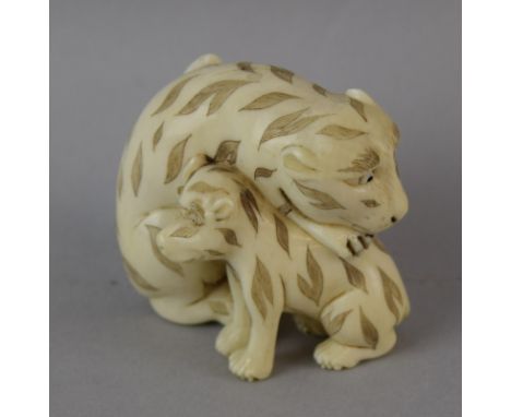 Ivory Netsuke in the shape of a pair of Animals 5cm tall