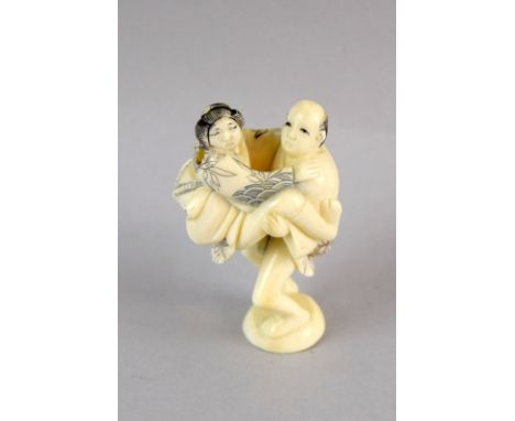 Ivory Netsuke in the shape of Erotica 6cm tall signed