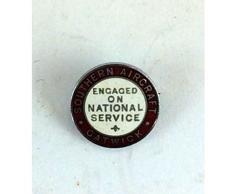 A rare WW2 chrome and enamel lapel badge Engaged On National Service Southern Aircraft Gatwick. Numbered 271 to the reverse. 