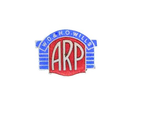 A rare WW2 Air Raid Precautions chrome and enamel lapel badge to W.D. & H.O. WILLS ARP made by Fattorini