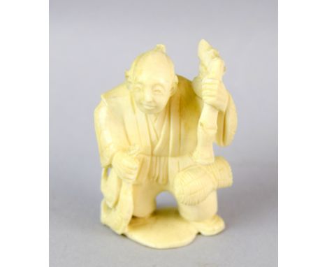 Ivory Netsuke in the shape of an Old Fisherman signed at base 6cm