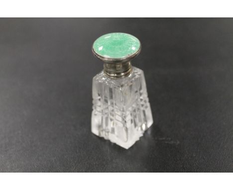 A SILVER AND ENAMEL MINIATURE SCENT BOTTLE