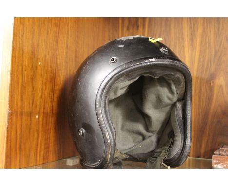 A VINTAGE MOTORCYCLE HELMET