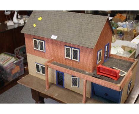 A VINTAGE DOLLS HOUSE