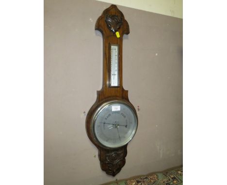 A SMALL OAK BAROMETER S/D