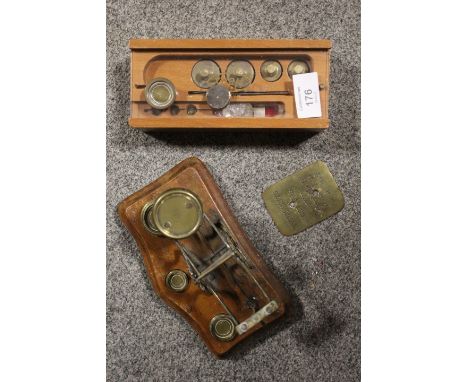 A SMALL SET OF SCALES TOGETHER WITH A SET OF WEIGHTS