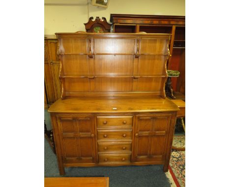 AN ERCOL DRESSER WITH RACK W-146 CM