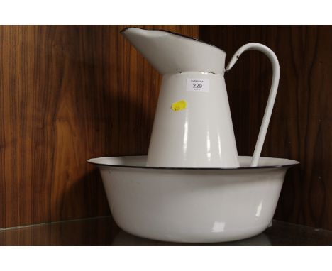 A VINTAGE ENAMEL JUG AND BOWL SET