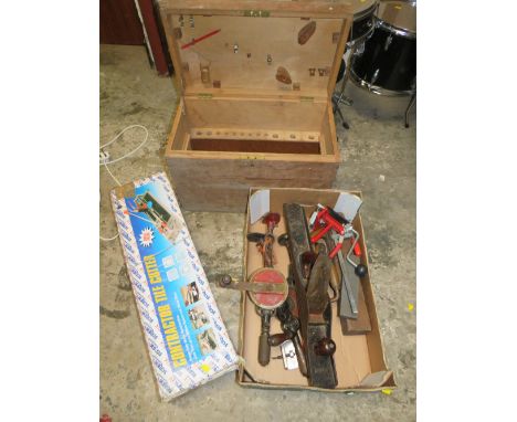 A WOODEN CARPENTERS TOOL BOX WITH VARIOUS WOODWORKING TOOLS AND A TILE CUTTER