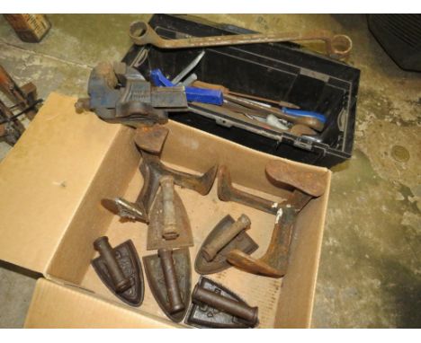 A PLASTIC TOOLBOX WITH VARIOUS TOOLS TOGETHER WITH STEEL HAND IRONS, COBBLERS LASTS AND VICE