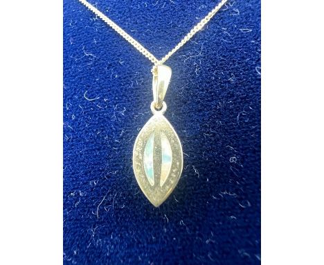 A set of matching simulated Gilson opal jewellery. Featuring a pair of drop earrings with a smooth drop of simulated opal, fa