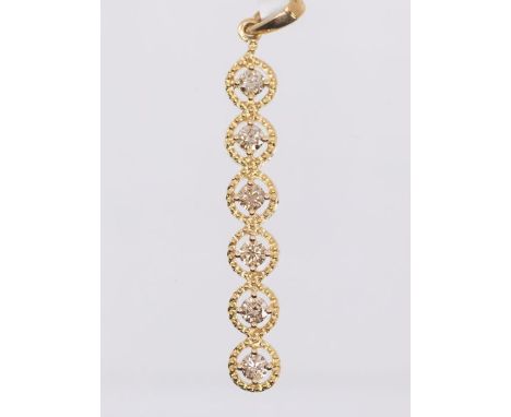A fancy light brown diamond pendant in 9ct yellow gold. Featuring six round brilliant cut diamonds, with an estimated total w