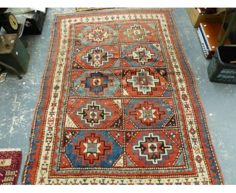 AN ANTIQUE CAUCASIAN KAZAK RUG. 210 x 139cm