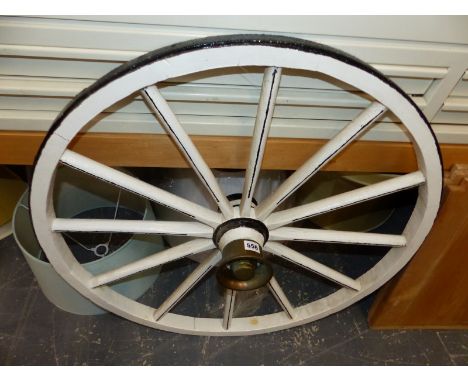 A VINTAGE CART WHEEL. 