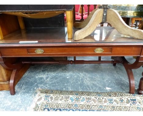 AN OAK ROTATING DESK CHAIR WITH RED LEATHER SEAT, A BUTTONED BLACK LEATHER STOOL, A GILT WOOD FOOT STOOL TOGETHER WITH A CROS