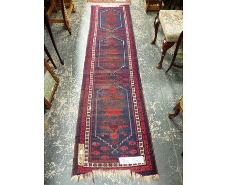 THREE ORIENTAL RUGS, A TURKISH RUNNER 270 x 69cm, A BELOUCH PRAYER RUG 148 x 86cm AND A BOKHARA DESIGN RUG 150 x 92cm (3)