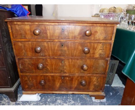 A WALNUT CHEST OF FOUR GRADED DRAWERS ON BRACKET FEET