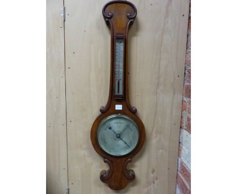 SATTELY AND SONS. TETBURY, A VICTORIAN OAK CASED WHEEL BAROMETER WITH ALCOHOL THERMOMETER ABOVE THE SILVERED DIAL.&nbsp; &nbs