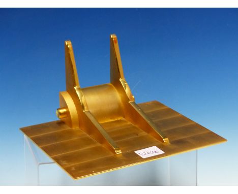A GILT BRASS ATMOS CLOCK WALL BRACKET, THE SUPPORTING PLATE.&nbsp; &nbsp;21.5 x 16.5cms.