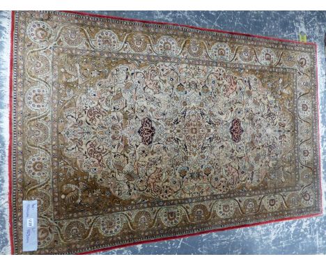 A PERSIAN SILK QUM BIRD AND ANIMAL RUG.  163 x 104cms