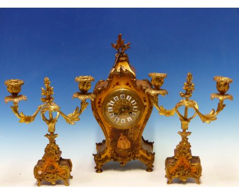 A FRENCH CLOCK GARNITURE, THE BALLOON SHAPED GOLD GROUND CLOCK WITH ENAMELLED NUMERALS SET IN A GILT FACE, THE MARTI MOVEMENT