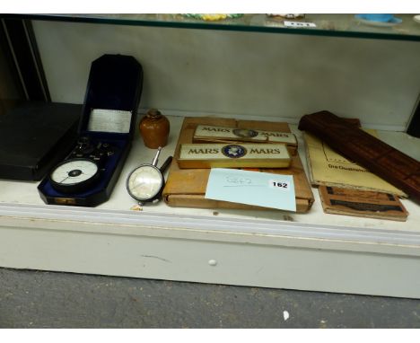 A VINTAGE BOXED REVOLUTION COUNTER, MICROMETER, TWO BOXES STAEDTLER MARS PENCILS, A CRIBBAGE BOARD ETC.