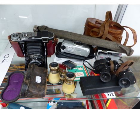 A ZEISS IKON CAMERA, ZEISS JENA TELACT BINOCULARS A KODAK INSTAMATIC 100 CAMERA, A PENTAX ESPIO 115V CAMERA, A ZEISS TRIPOD,E